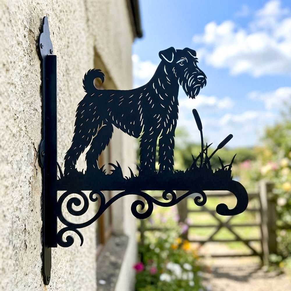 Airedale terrier metal hanging basket bracket mounted on outdoor wall for plant decoration