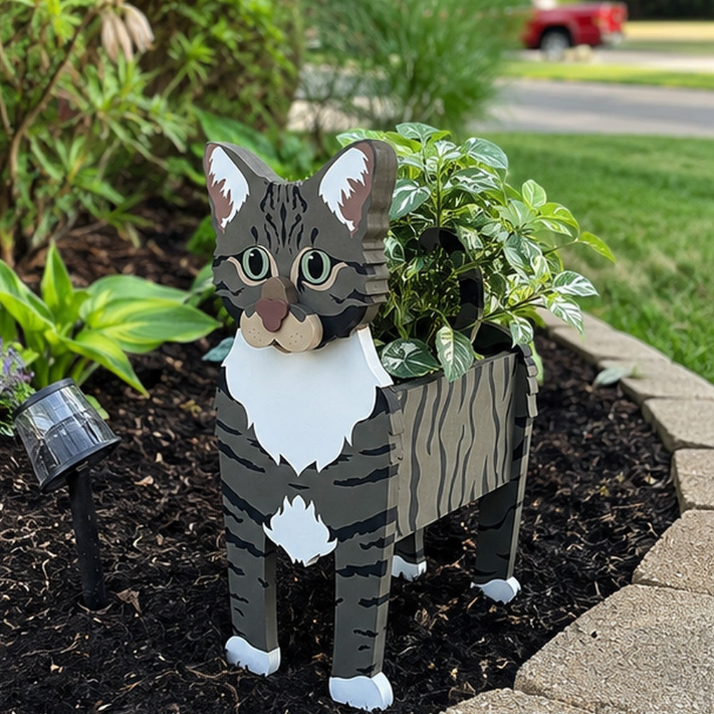 American Shorthair cat planter filled with fresh flowers is placed in the garden