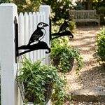 Atlantic puffin bird metal hanging basket bracket mounted on outdoor wall for plant decoration