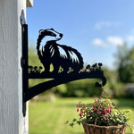Badger metal hanging basket bracket mounted on outdoor wall for plant decoration