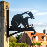 Badger metal hanging basket bracket mounted on outdoor wall for plant decoration
