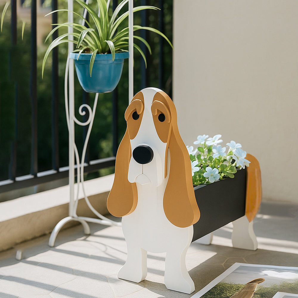 Basset Hound dog planter with a potted plant on a patio