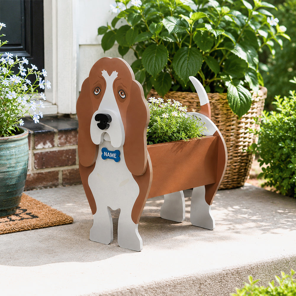 Basset Hound dog planter displayed on a patio with plants in the background
