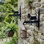 Basset hound metal hanging basket bracket mounted on outdoor wall for plant decoration
