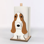 Basset Hound Wooden Dog Paper Towel Holder displayed on a kitchen countertop with a freestanding paper towel roll