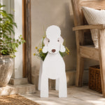 Bedlington Terrier dog planter  with a plant and chair in the background