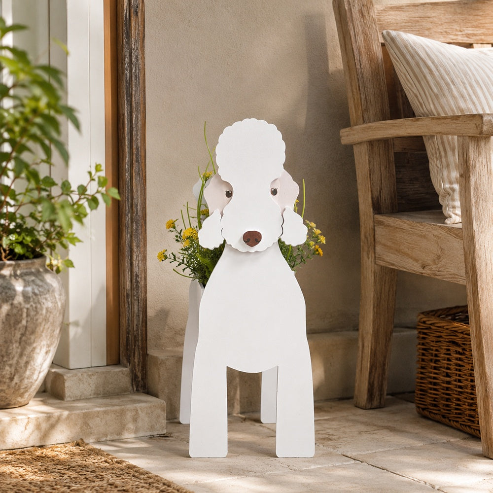 Bedlington Terrier dog planter  with a plant and chair in the background