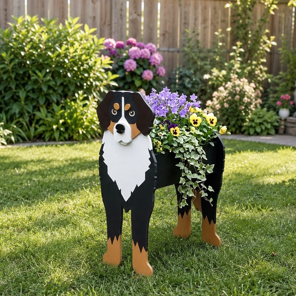Bernese Mountain dog planter filled with fresh flowers is placed in the garden
