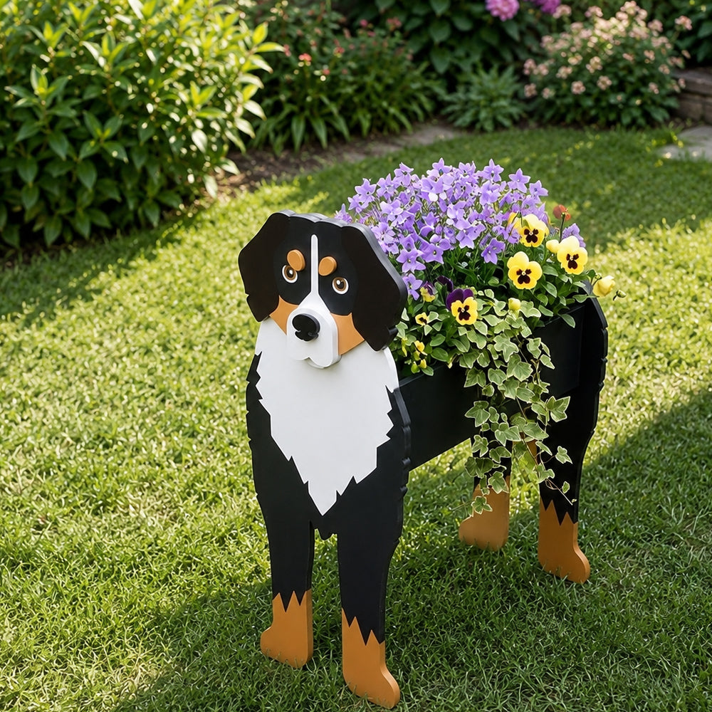 Bernese Mountain dog planter filled with fresh flowers is placed in the garden