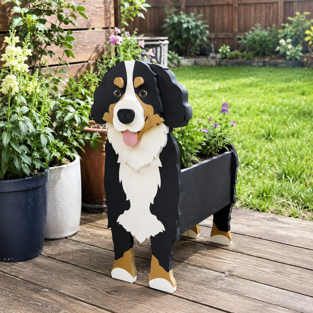 Bernese Mountain dog planter filled with fresh flowers is placed in the garden