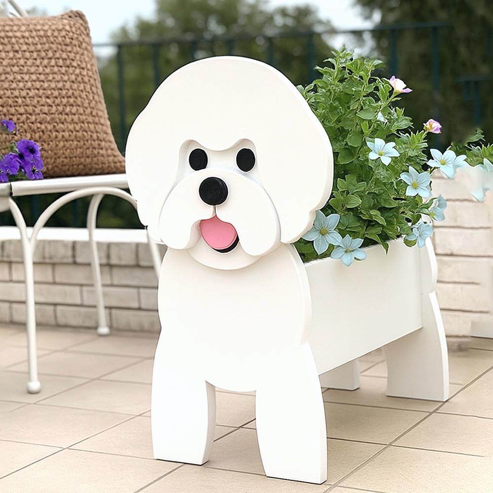 Bichon Friese dog planter filled with fresh flowers is placed in the garden