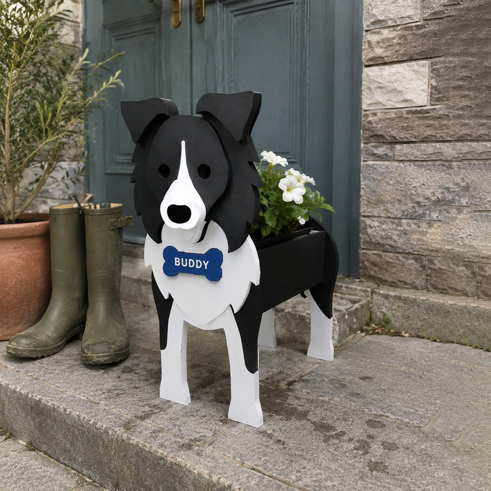 Border Collie dog planter filled with fresh flowers is placed in the garden
