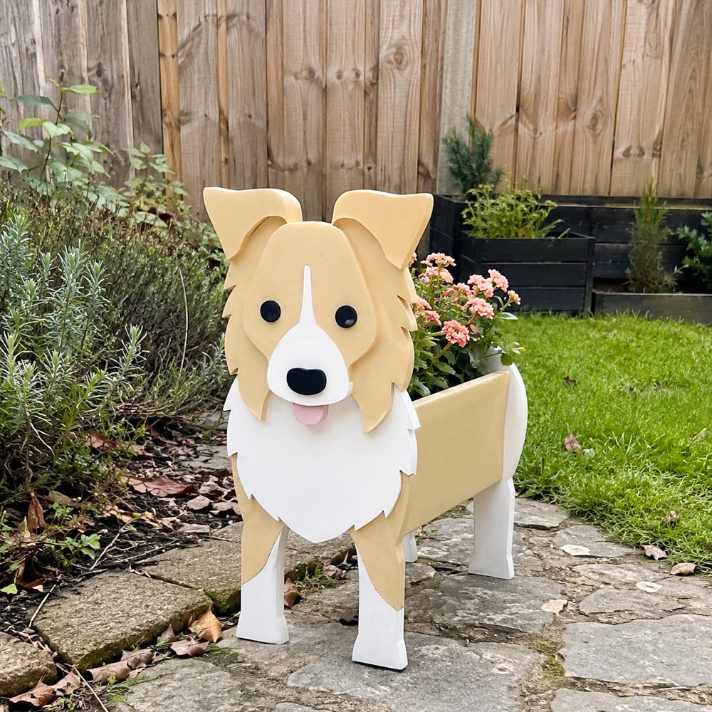 Border Collie dog planter filled with fresh flowers is placed in the garden
