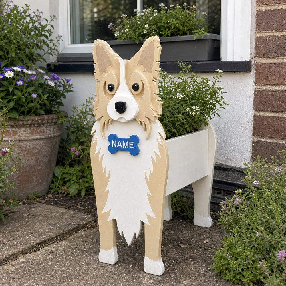 Border Collie dog planter filled with fresh flowers is placed in the garden