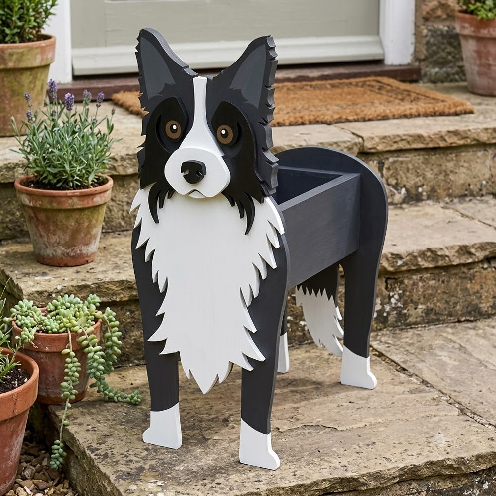 Border Collie dog planter filled with fresh flowers is placed in the garden