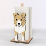 Border Collie Wooden Dog Paper Towel Holder displayed on a kitchen countertop with a freestanding paper towel roll