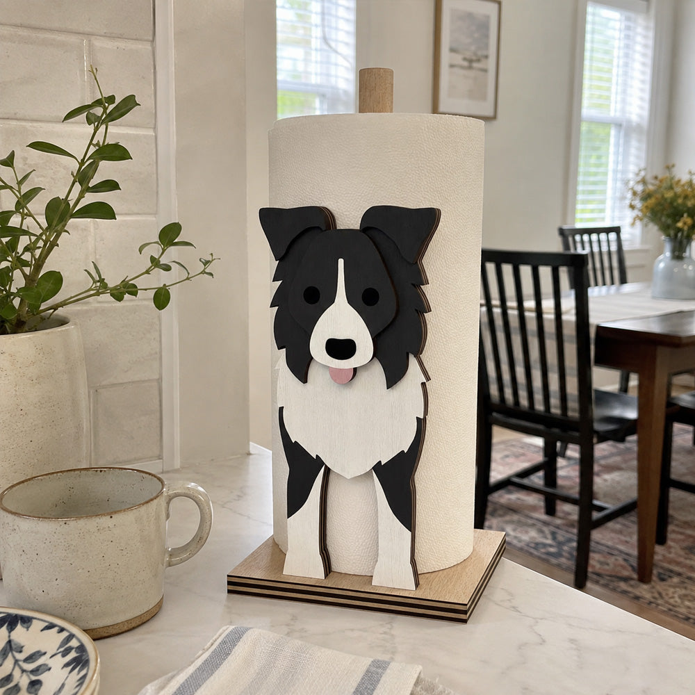 Border Collie Wooden Dog Paper Towel Holder displayed on a kitchen countertop with a freestanding paper towel roll
