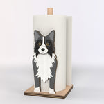 Border Collie Wooden Dog Paper Towel Holder displayed on a kitchen countertop with a freestanding paper towel roll
