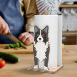 Border Collie Wooden Dog Paper Towel Holder displayed on a kitchen countertop with a freestanding paper towel roll