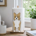 Border Collie Wooden Dog Paper Towel Holder displayed on a kitchen countertop with a freestanding paper towel roll