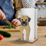 Border Terrier Wooden Dog Paper Towel Holder displayed on a kitchen countertop with a freestanding paper towel roll