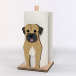 Border Terrier Wooden Dog Paper Towel Holder displayed on a kitchen countertop with a freestanding paper towel roll