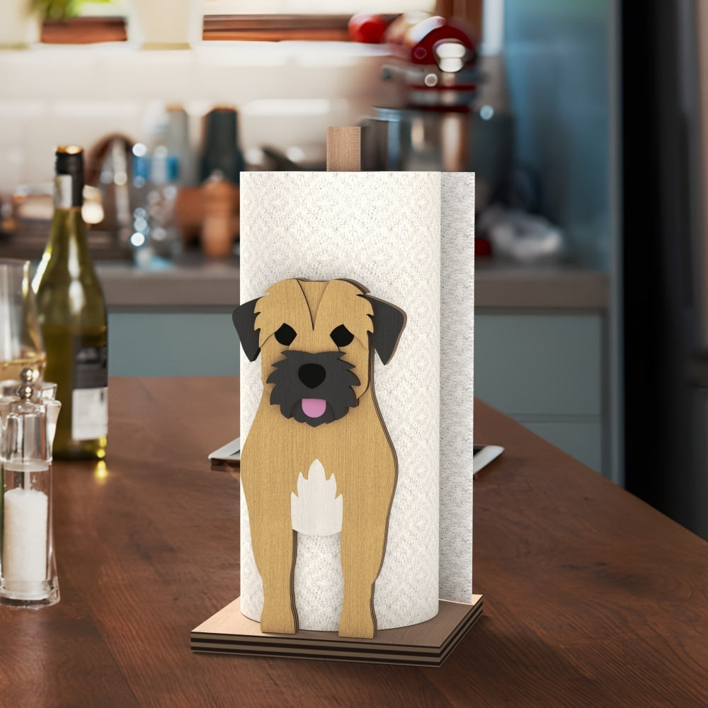 Border Terrier Wooden Dog Paper Towel Holder displayed on a kitchen countertop with a freestanding paper towel roll