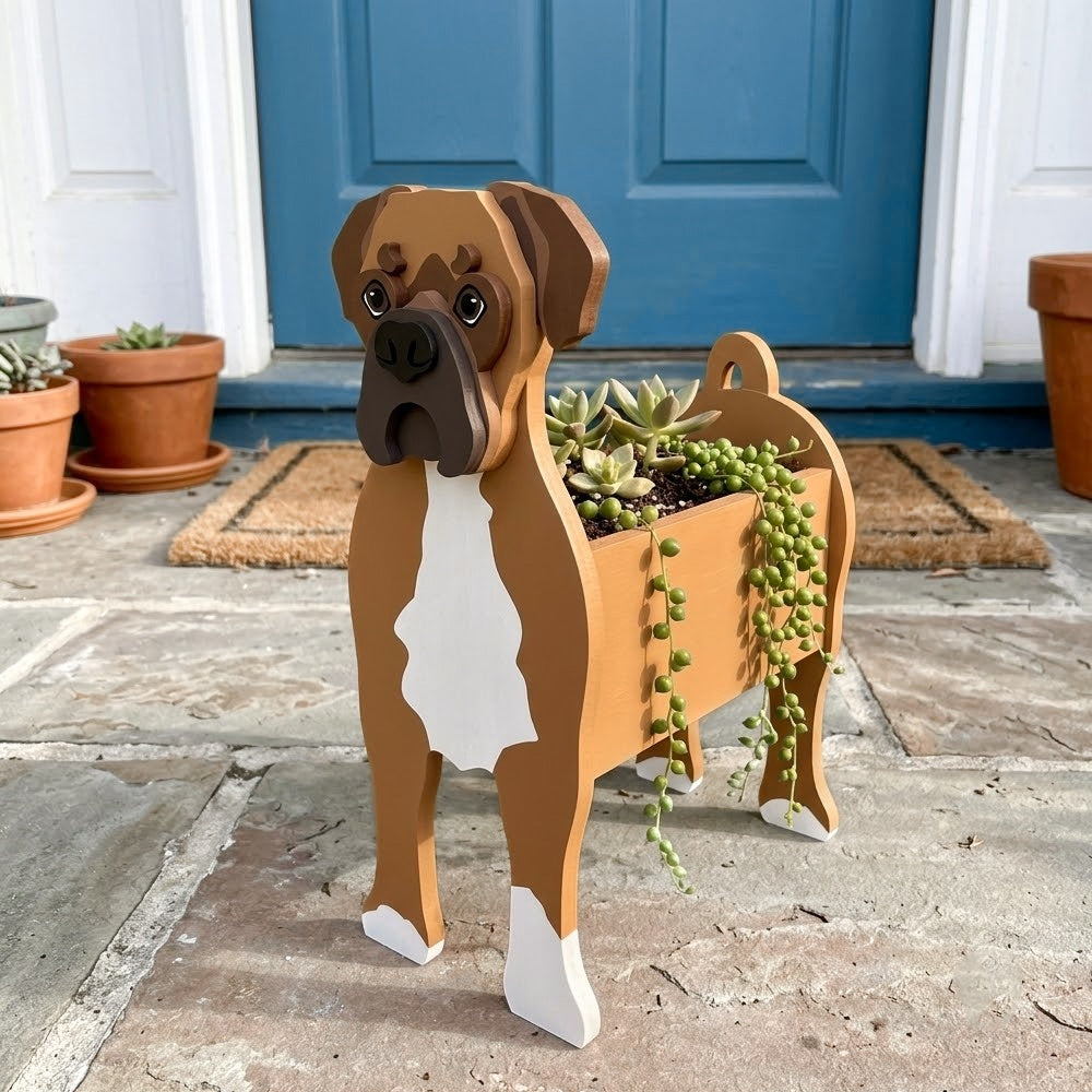Boxer dog planter filled with fresh flowers is placed in the garden