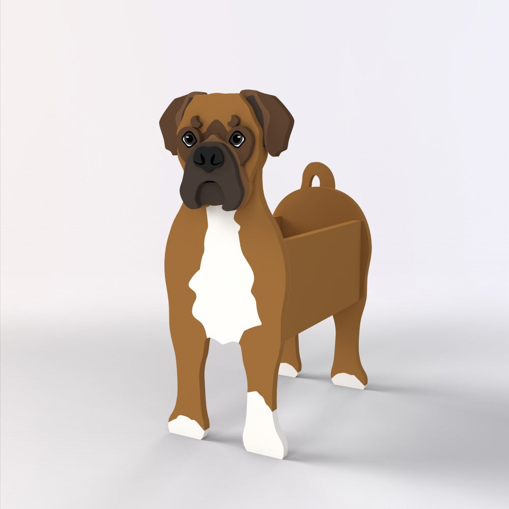 Boxer dog planter filled with fresh flowers is placed in the garden