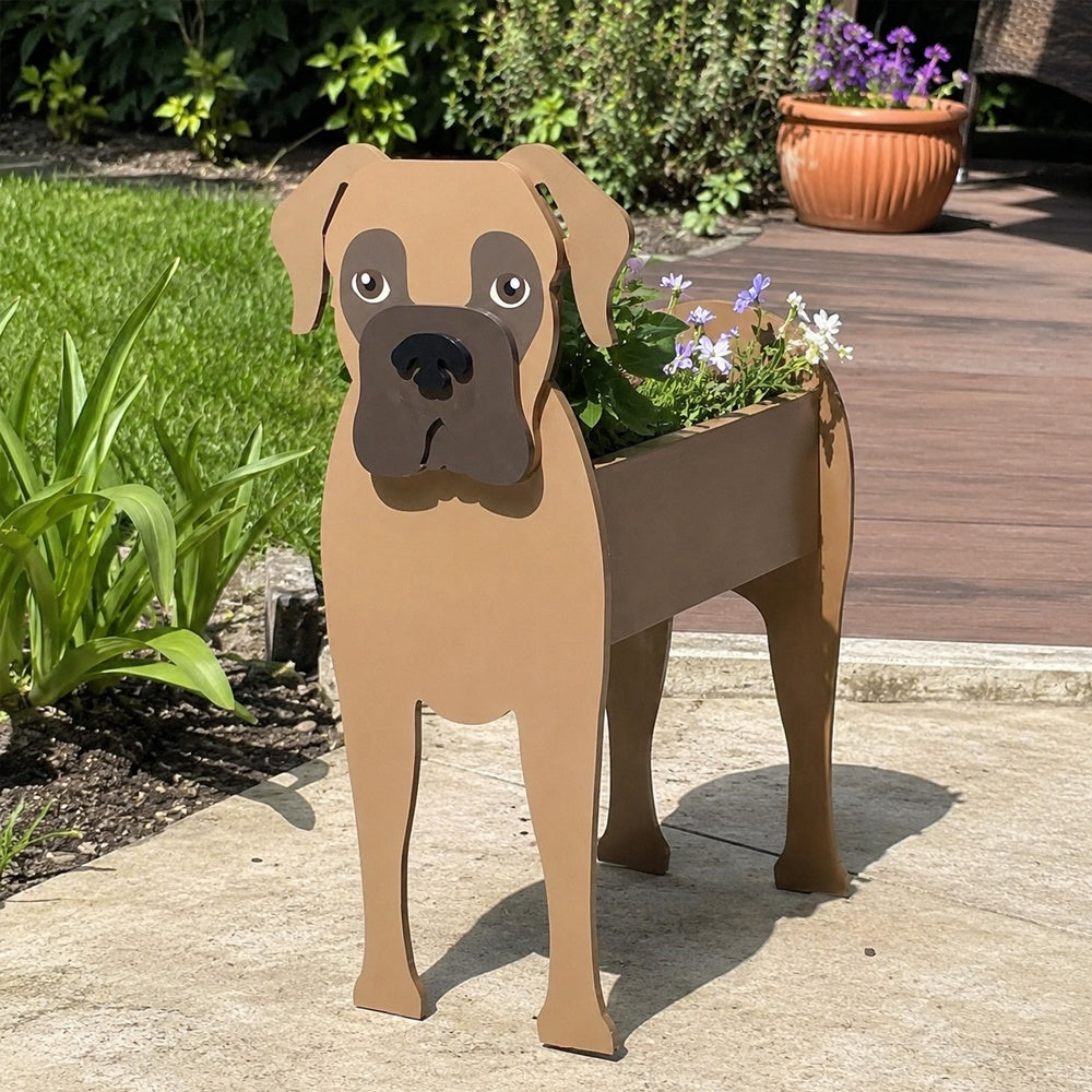 Boxer dog planter filled with fresh flowers is placed in the garden