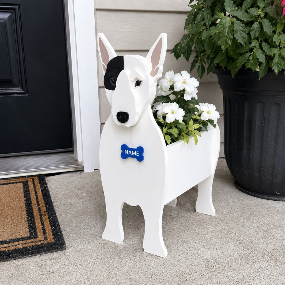 Bull Terrier dog planter filled with fresh flowers is placed in the garden