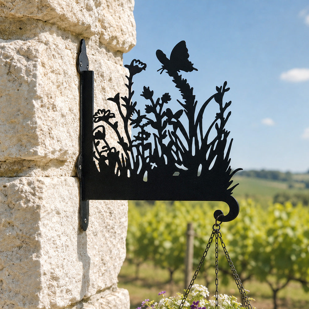 Butterfly and wildflowers meadow metal hanging basket bracket mounted on outdoor wall for plant decoration