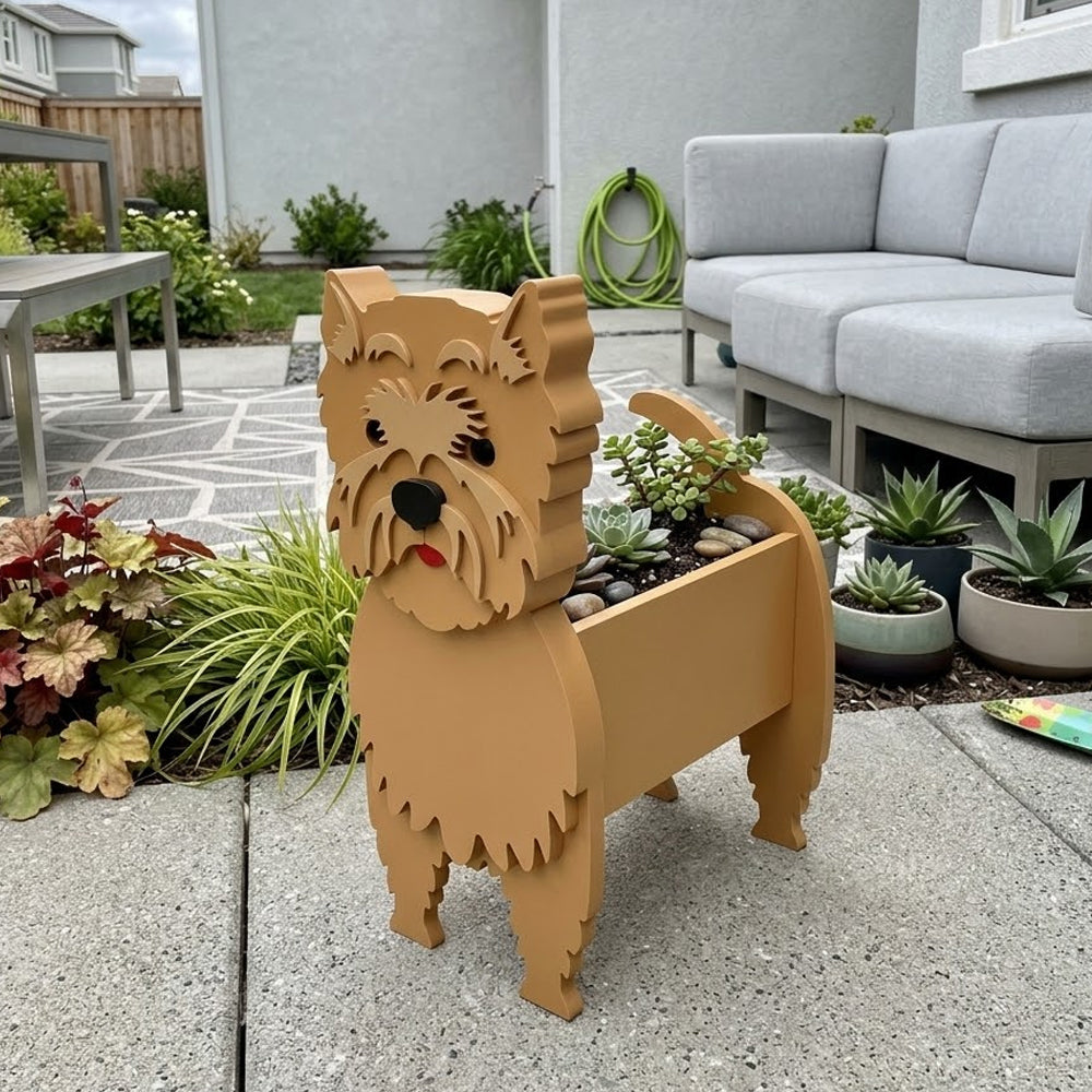 Cairn Terrier dog planter filled with fresh flowers is placed in the garden