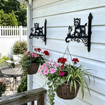 Cairn terrier metal hanging basket bracket mounted on outdoor wall for plant decoration