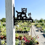 Cairn terrier metal hanging basket bracket mounted on outdoor wall for plant decoration