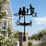 Cat family on chimney metal weather vane with directional arrows and mounting rod, outdoor roof and garden decoration