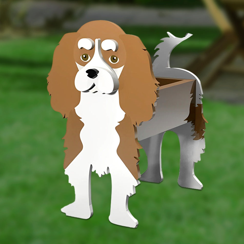 Cavalier King Charles Spaniel dog planter filled with fresh flowers is placed in the garden.