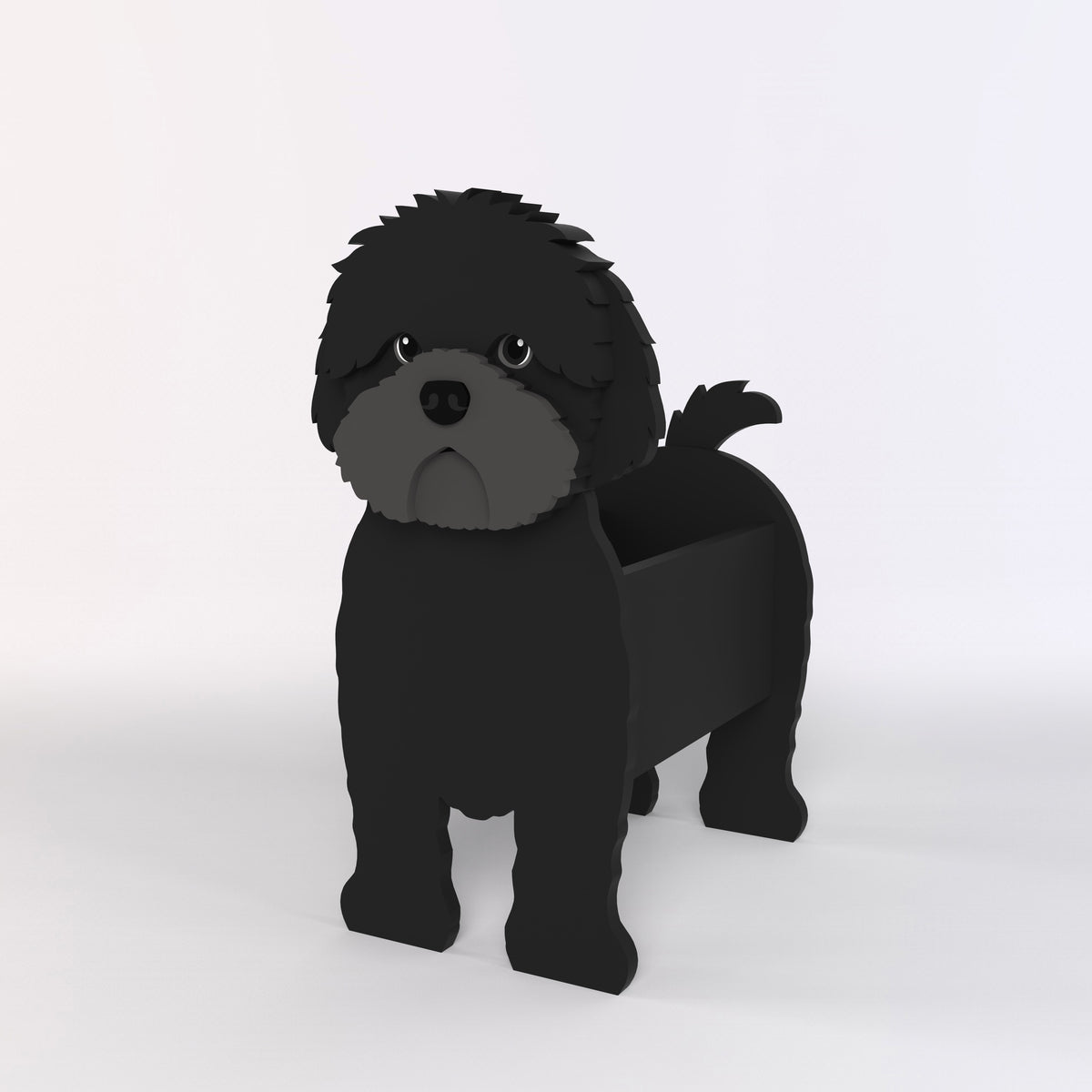 Adorable black cavapoo-shaped dog planter on a light gray background