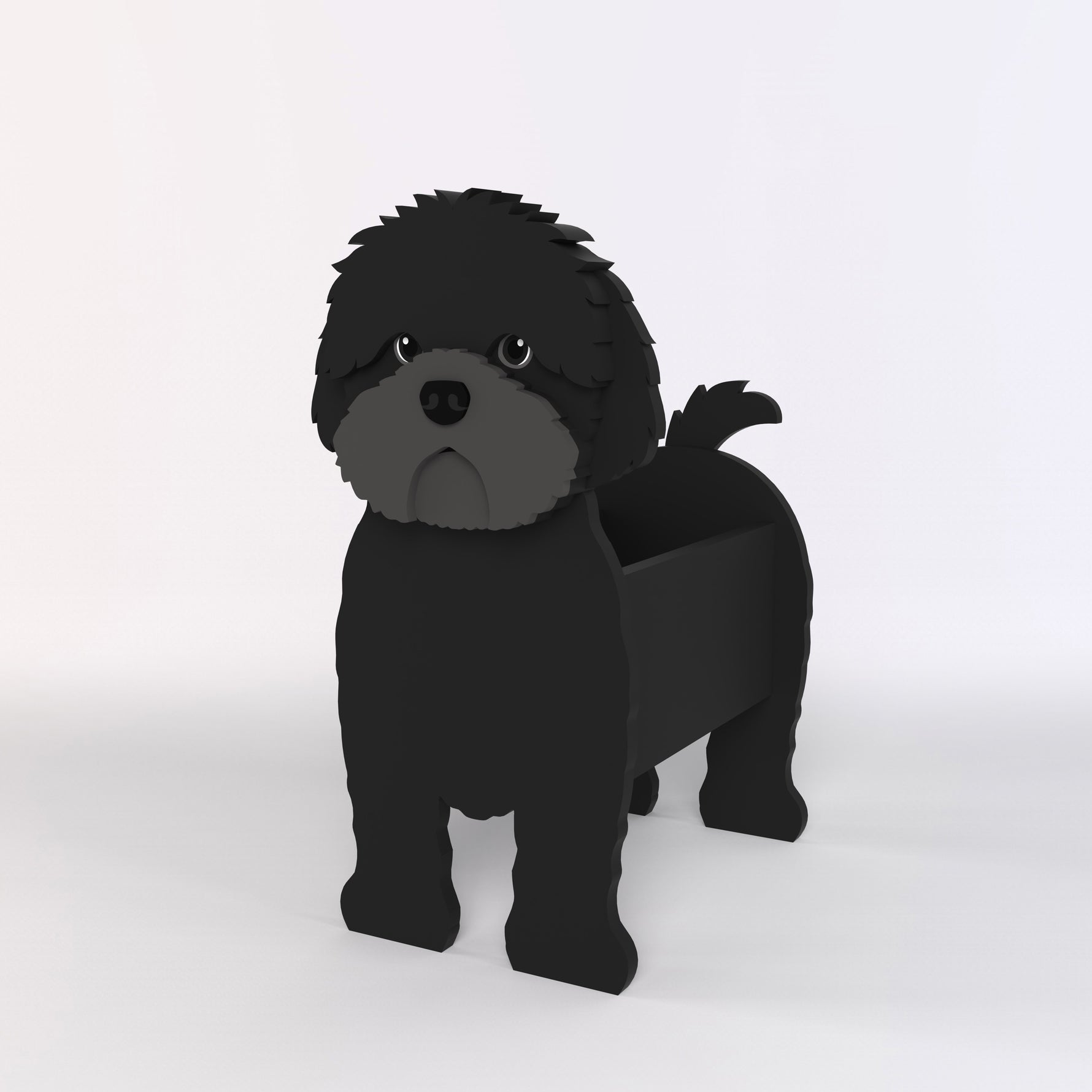 Adorable black cavapoo-shaped dog planter on a light gray background