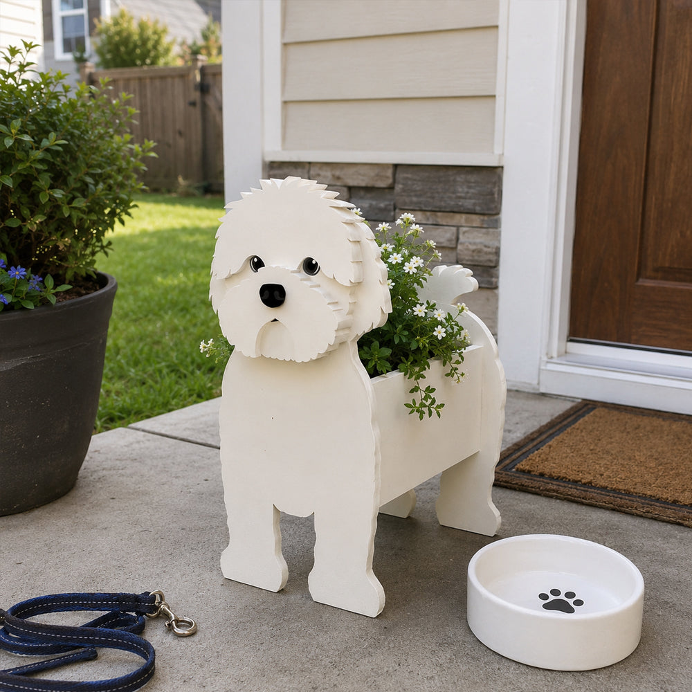 White cavapoo-shaped dog planter containing flowers, decorating the porch