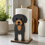 Cavoodle Wooden Dog Paper Towel Holder displayed on a kitchen countertop with a freestanding paper towel roll