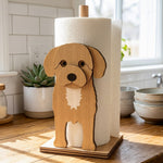 Cavoodle Wooden Dog Paper Towel Holder displayed on a kitchen countertop with a freestanding paper towel roll