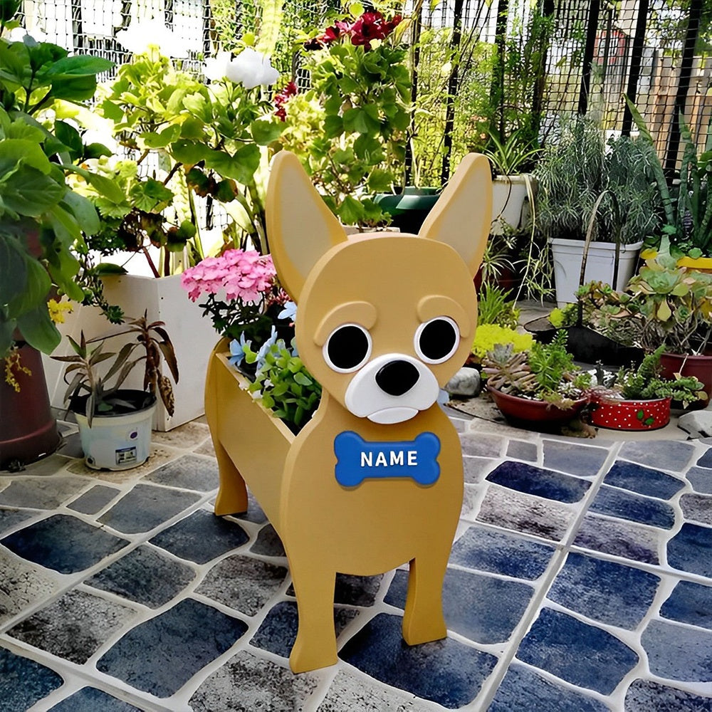 Chihuahua dog planter filled with fresh flowers is placed in the garden