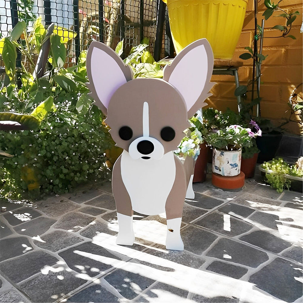 Chihuahua dog planter filled with fresh flowers is placed in the garden