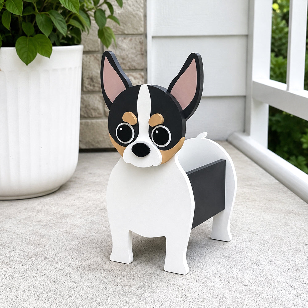 Chihuahua dog planter filled with fresh flowers is placed in the garden