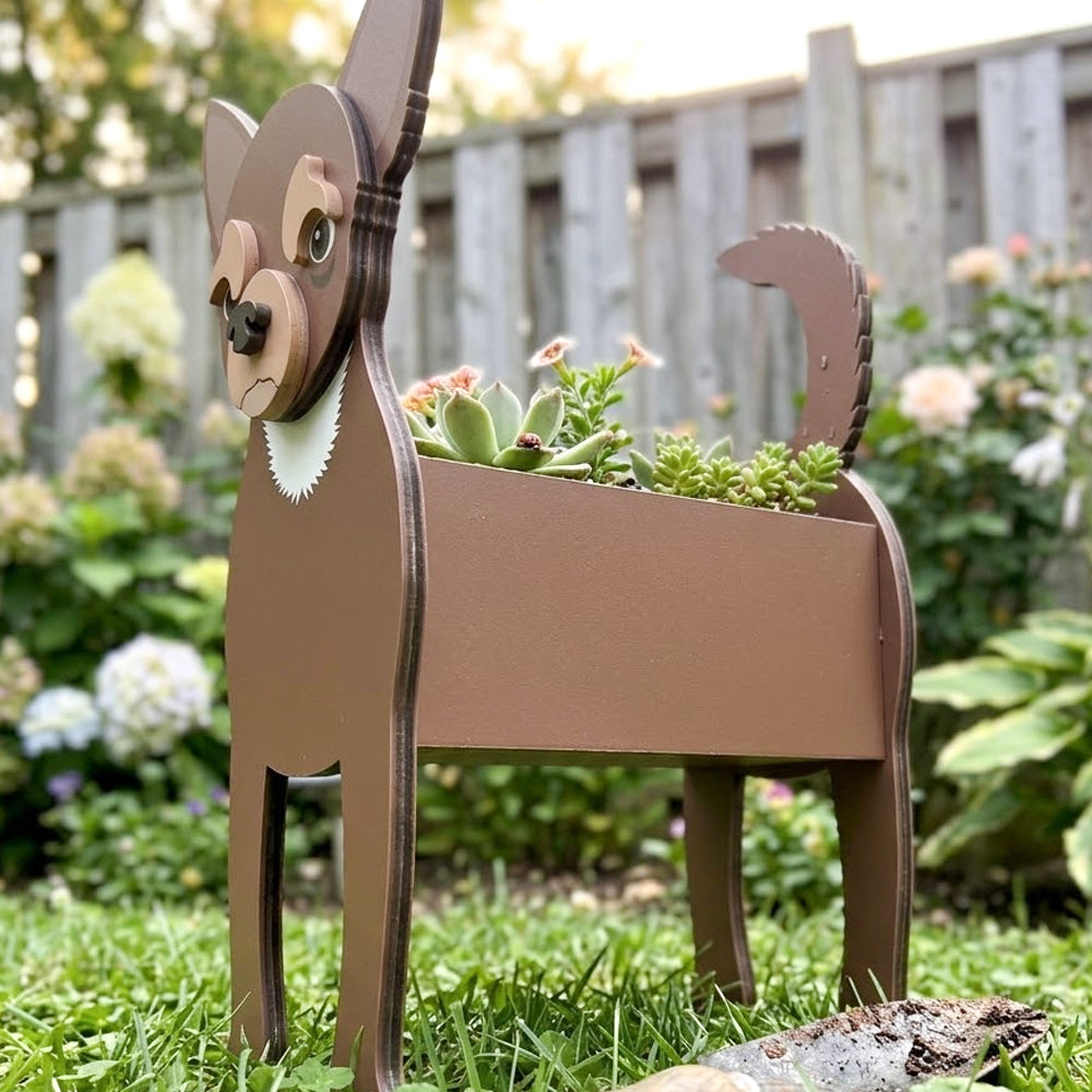 Chihuahua dog planter filled with fresh flowers is placed in the garden