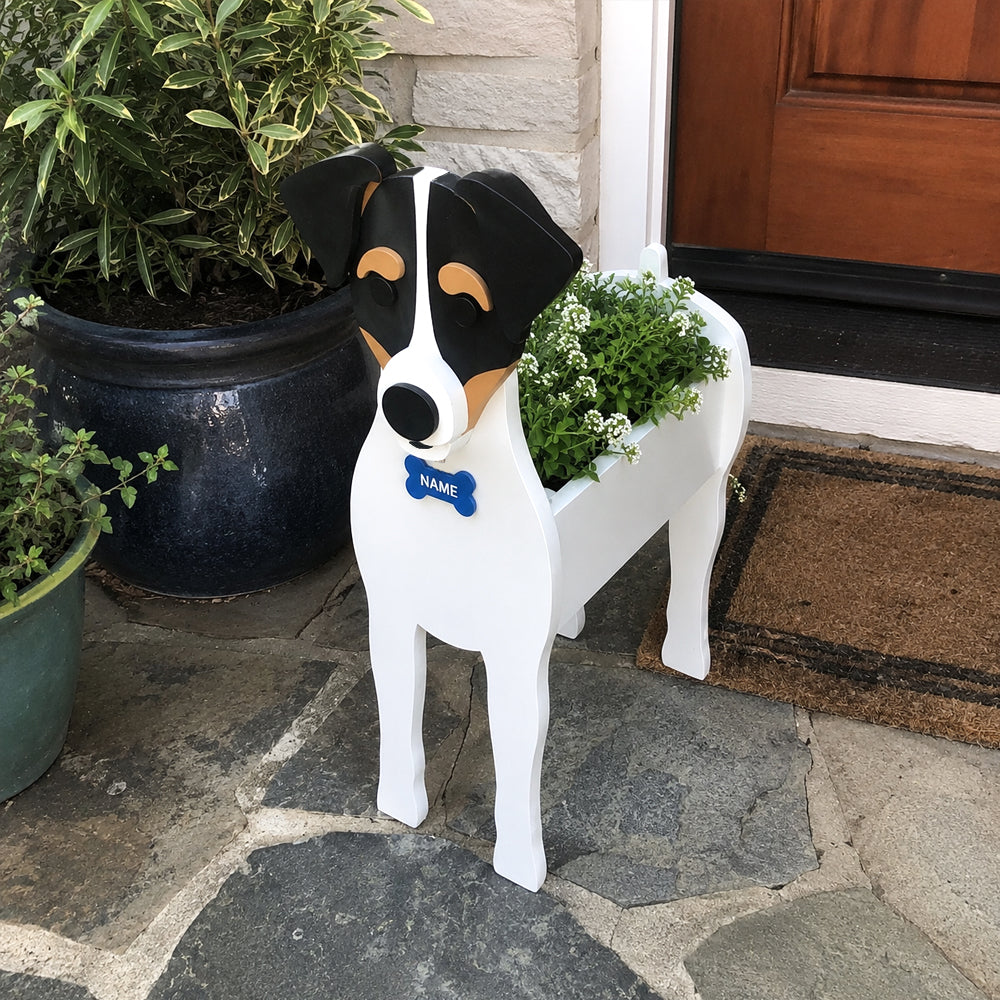 Chilean Fox Terrier dog planter filled with fresh flowers is placed in the garden