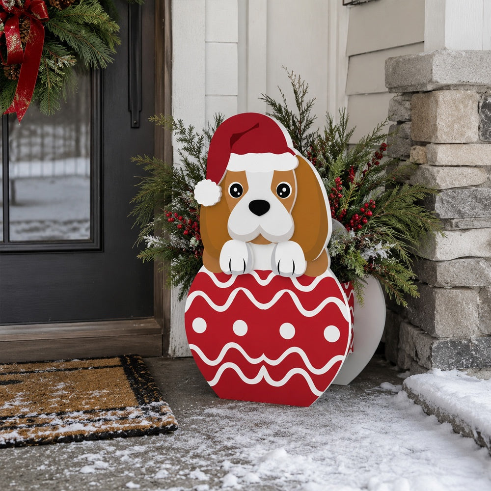 Christmas Beagle dog planter filled with fresh flowers is placed in the garden
