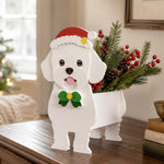Christmas Bichon Frise dog planter filled with fresh flowers is placed in the garden