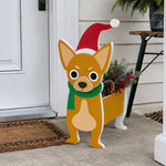 Christmas Chihuahua dog planter filled with fresh flowers is placed in the garden